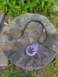Resin teardrop cannabis leaf pendant black cord