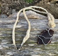 River Glass Necklace  brown river glass on silver wire wrapped 26 in  Hemp cord