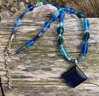 Glass acrylic & metal  beaded necklace with dichroic glass pendant