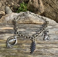 smaller Silver chainlink charm bracelet with grateful dead charms