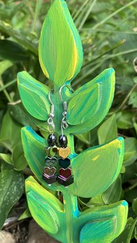 Chevron with pink blue and yellow descending topped with an oval hematite hearts fish hook earrings 