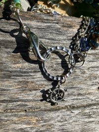 ornament sea life charm bracelet with a sea turtle , star fish, anchor,wheel with large lobster clasp closure  