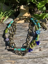 brass elephant and dichroic  flowers beaded bracelet 