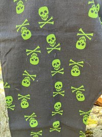 Handmade by Lucky Burrito Beautiful Hooded Scarves inspired by the designs of Sienna Rose* fully reversible heavy duty cotton canvas black with skull and cross bones motif opposite black cotton