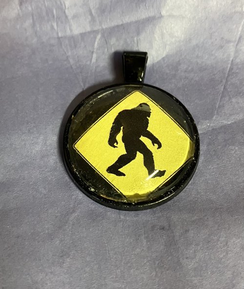 Sasquatch Glass   and metal Pendant