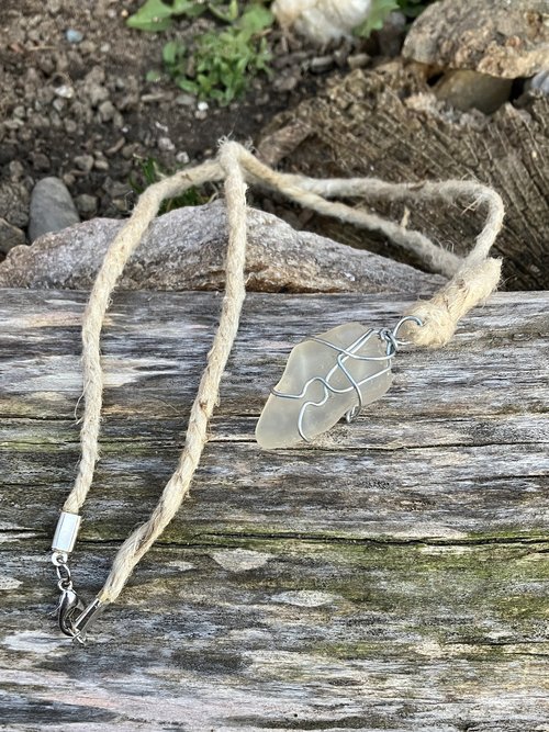 River Glass Necklace  river glass on silver wire wrapped 24 in  Hemp cord