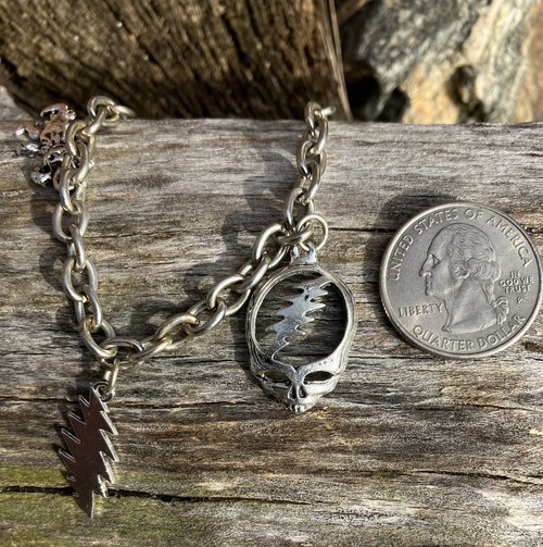smaller Silver chainlink charm bracelet with grateful dead charms