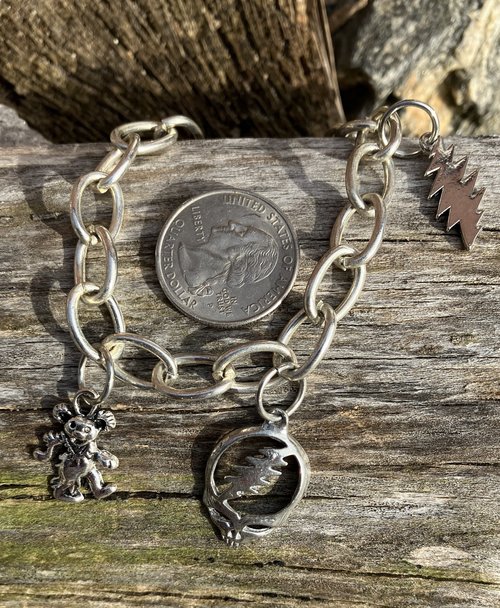 Silver chainlink charm bracelet with grateful dead charms