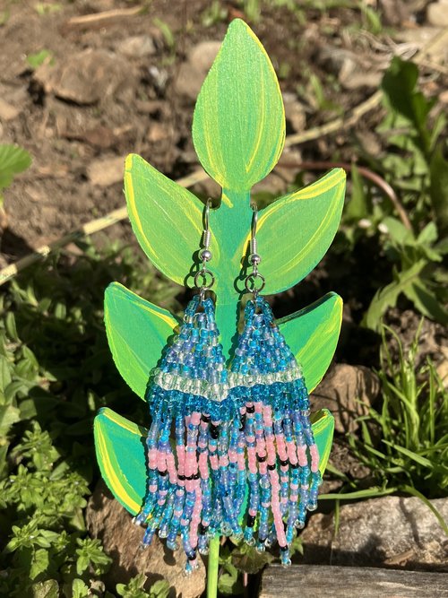 Pink Flamingo on a sparkly blue background of  seed bead earrings