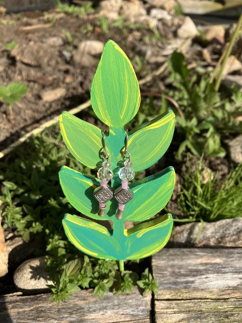crystal & flower stamped diamond shaped metal  bead  earrings