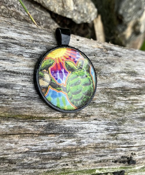 Grateful dead terrapin glass and metal pendant