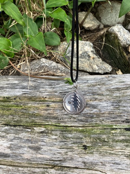 Grateful Dead  13 point lightning bolt  with beautiful stamped pendant that has the word "Grateful" embossed 