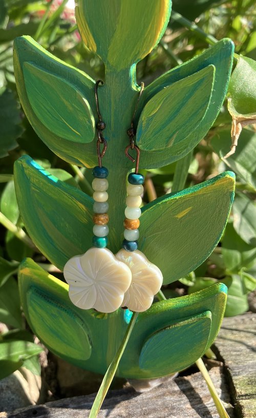 white hibiscus carved shell with czech beads on fish hook earrings 