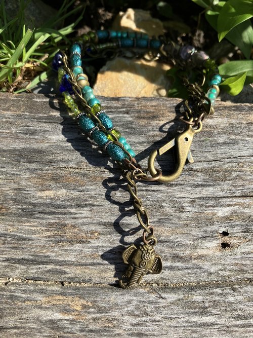 brass elephant and dichroic  flowers beaded bracelet 