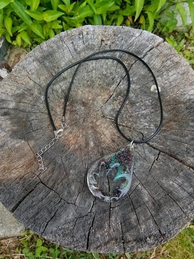 Resin teardrop cannabis leaf pendant black cord