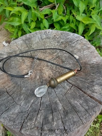 351 magnum bullet shell with saucer metal bead poly crystal bead necklace 