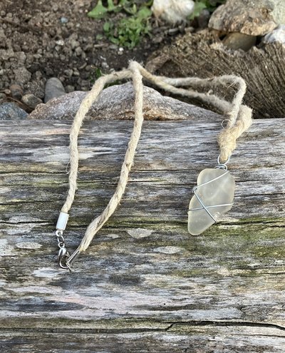 River Glass Necklace  river glass on silver wire wrapped 24 in  Hemp cord