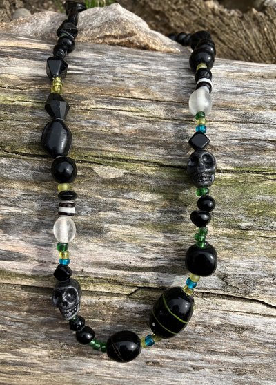 ceramic skulls  emerald and ebony  toned  glass beaded necklace 