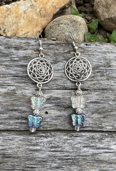 lotus flower charm with dichroic beads  fish hook earrings