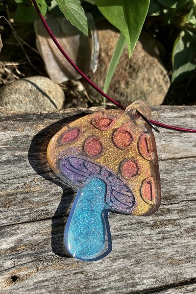  Resin pendant necklace Mushroom color changing  blue base Maroon cable