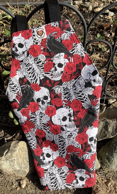 Handmade coffin bag by Lucky Burrito with crow, skeleton, and red roses design 