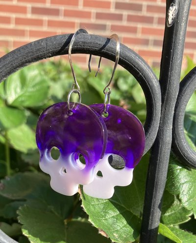 Resin purple and glow in the dark skull earrings