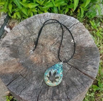 Resin teardrop cannabis leaf pendant black cord